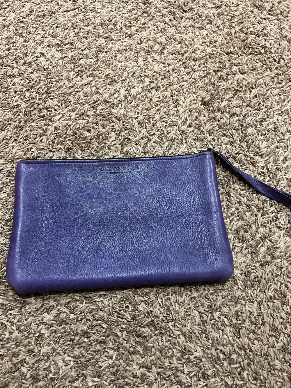 Camino Brands purple leather zipper pouch